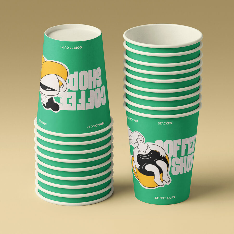 A Pixeden catalog mockup: two stacks of green paper coffee cups on a seamless khaki backdrop.